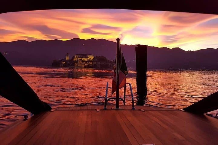 Private romantic sunset cruise on Lake Orta sipping wine on board — photo 1 of 6