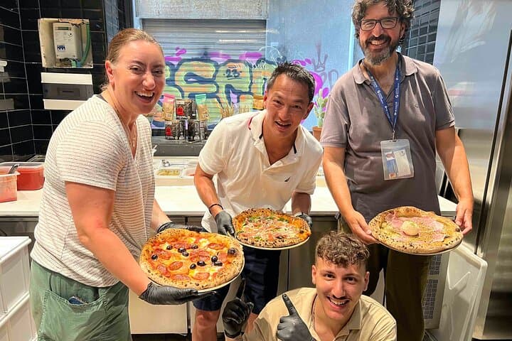 Pizza cooking class in real Pizzeria with Pizza chef & Tour guide — photo 1 of 11