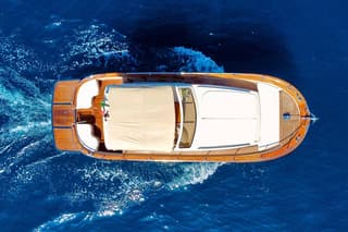 Luxury private boat tour to Capri and Blue Grotto on Gozzo 32 ft