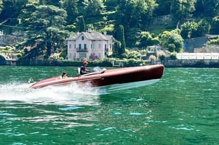 Private tour by wooden boat on Lake Como