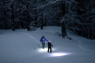 Night snowshoeing in Thures with typical dinner in a mountain hut
