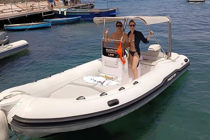 Capri 40 HP inflatable boat rental for groups of up to 6 people — photo 1 of 12