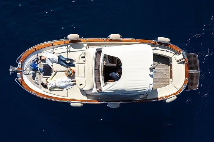 Three Hour Private Guided Tour of Capri with a luxury Gozzo cabin cruiser — photo 1 of 10
