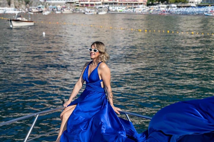 Positano Flying Dress photoshoot on a boat — photo 1 of 13