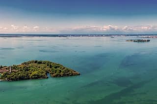 private cruise with sunset toast in Poveglia