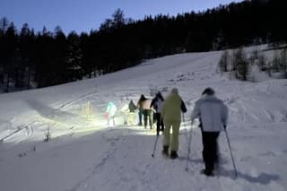 Sestriere Ciaspolata at sunset with aperitif in the hut