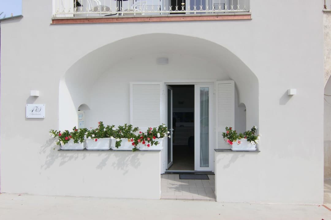 FOUR WHITE APARTMENTS — photo 1 of 1
