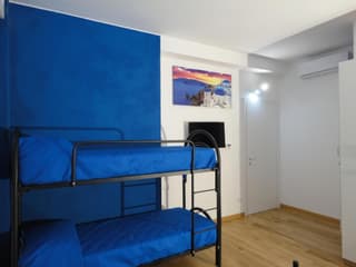 Quadruple Room with Private Bathroom
