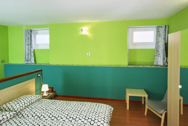 Quadruple Room with Private Bathroom