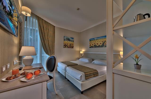 Double or Twin Room with Balcony and Partial Lake View