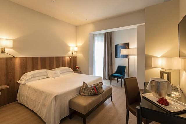 Superior Double Room with Partial Lake View and Small Balcony