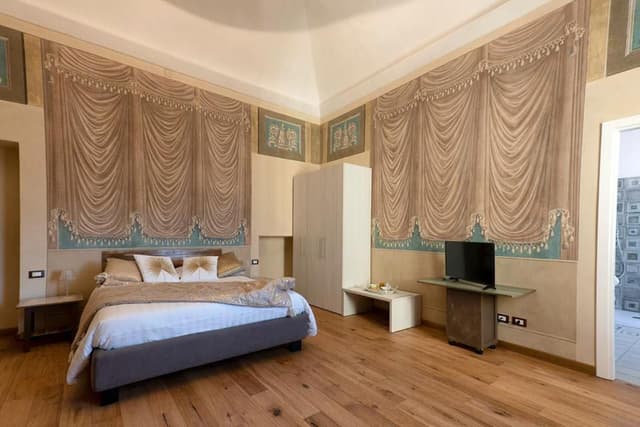 Quadruple Room with Private Bathroom