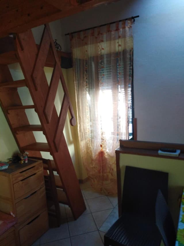 Quadruple Room with Private Bathroom