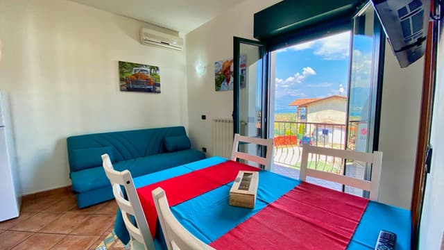 Apartment with Balcony and Lake View - Street Side