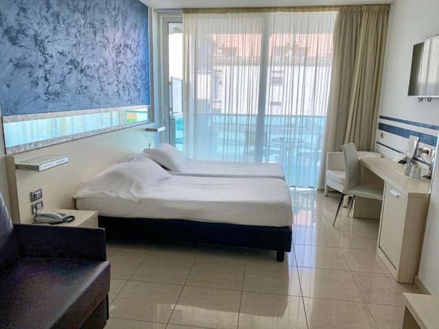 Superior Twin Room with Balcony and Side Sea View