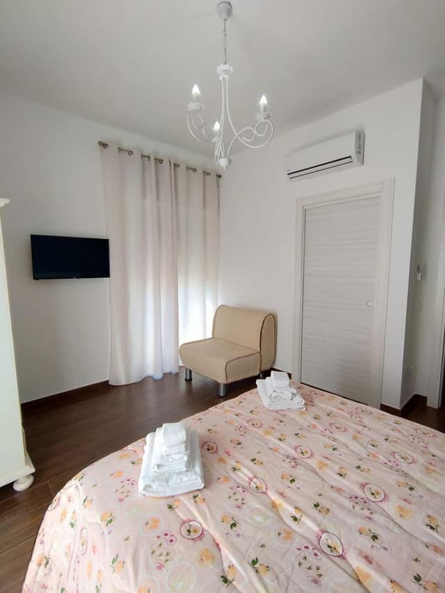 Quadruple Room with Private Bathroom