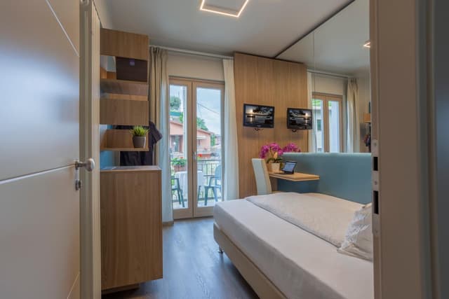 Small Double Room with Balcony and Partial Lake View