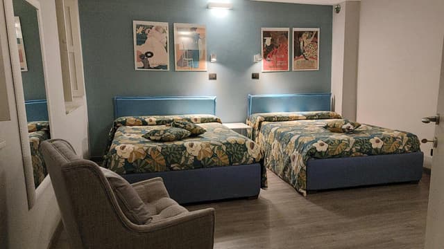Quadruple Room with Private Bathroom