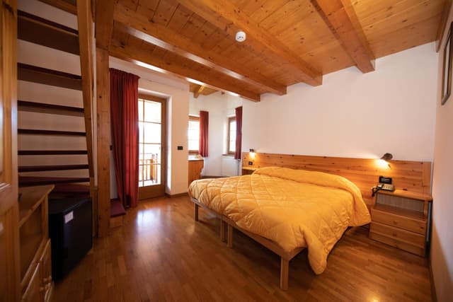 Triple Room (2 Adults + 1 Child)