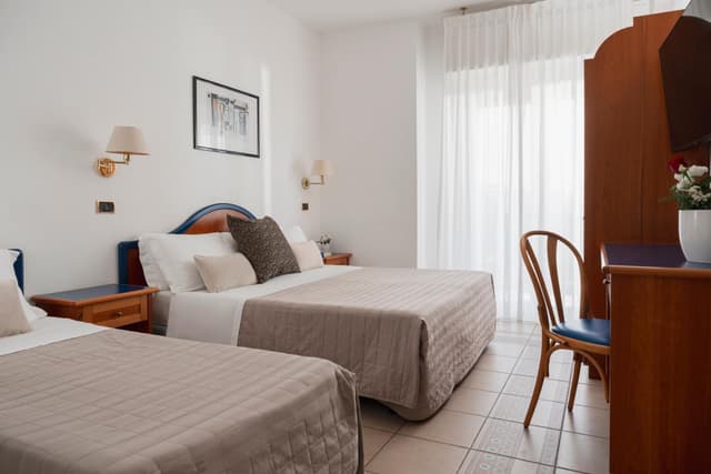 Comfort Triple Room with Lateral Sea View