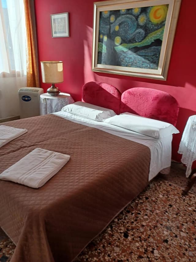 Triple Room with Canal View Shared Bathroom