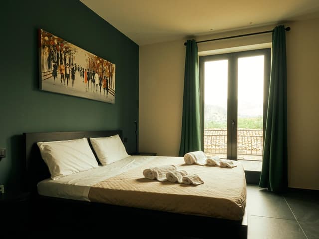 Double Room with Balcony (2 Adults + 1 Child)