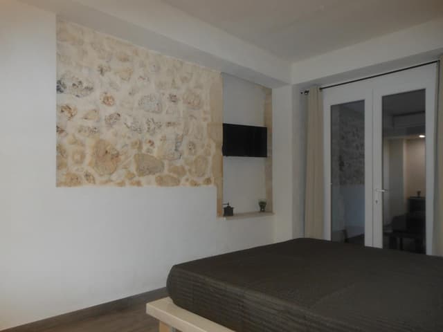 Quadruple Room with Private Bathroom