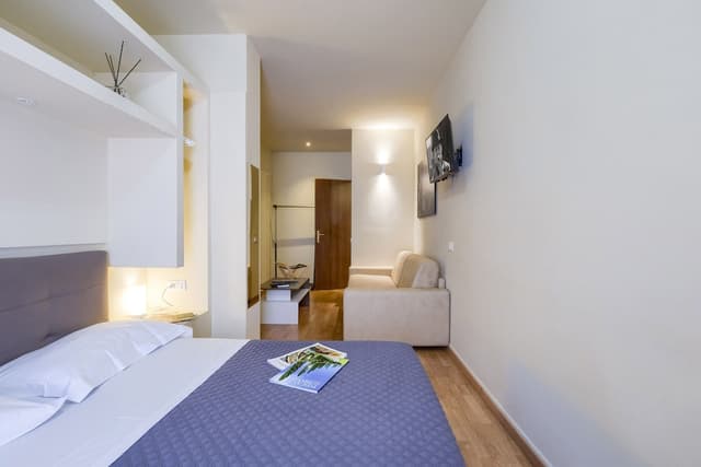Queen Room with Balcony and External Private Bathroom