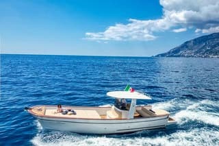 Capri Private Gozzo Boat Tour with Skipper, Drinks & Swim Stops