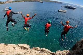 Coasteering at Cala Dragunara in Porto Conte Park from Alghero
