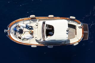 Three Hour Private Guided Tour of Capri with a luxury Gozzo cabin cruiser