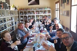Pozzolengo Tasting 3 glasses of wine with cutting board