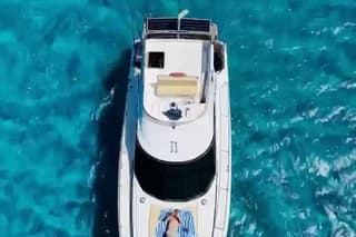 Day on Azimut Yacht in Stintino Pelosa Beach