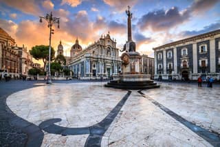Baroque Catania between fire, lava stone, and holiness